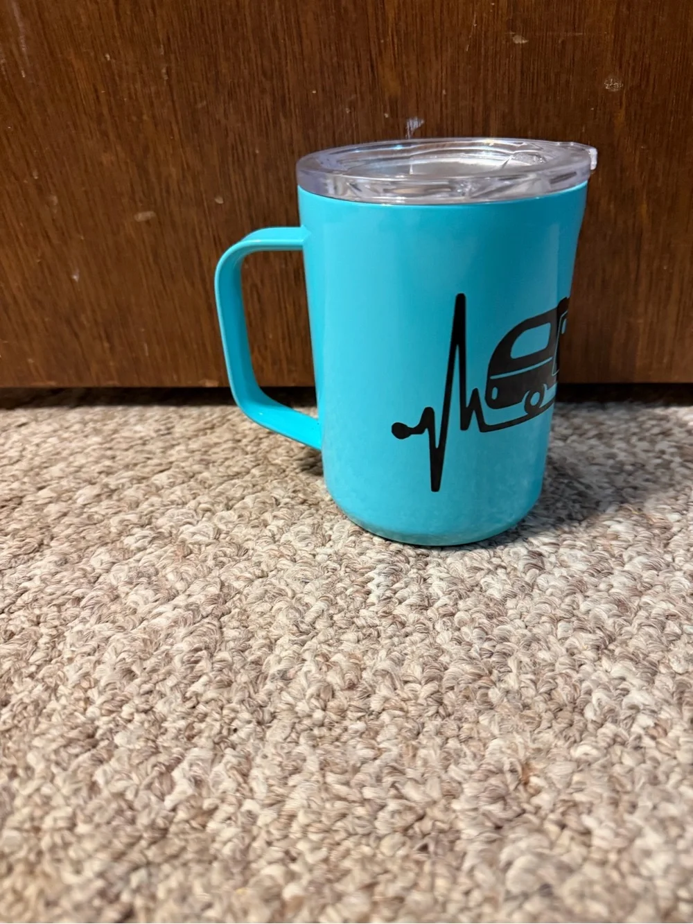 Corkcicle coffee tumbler with camper design.